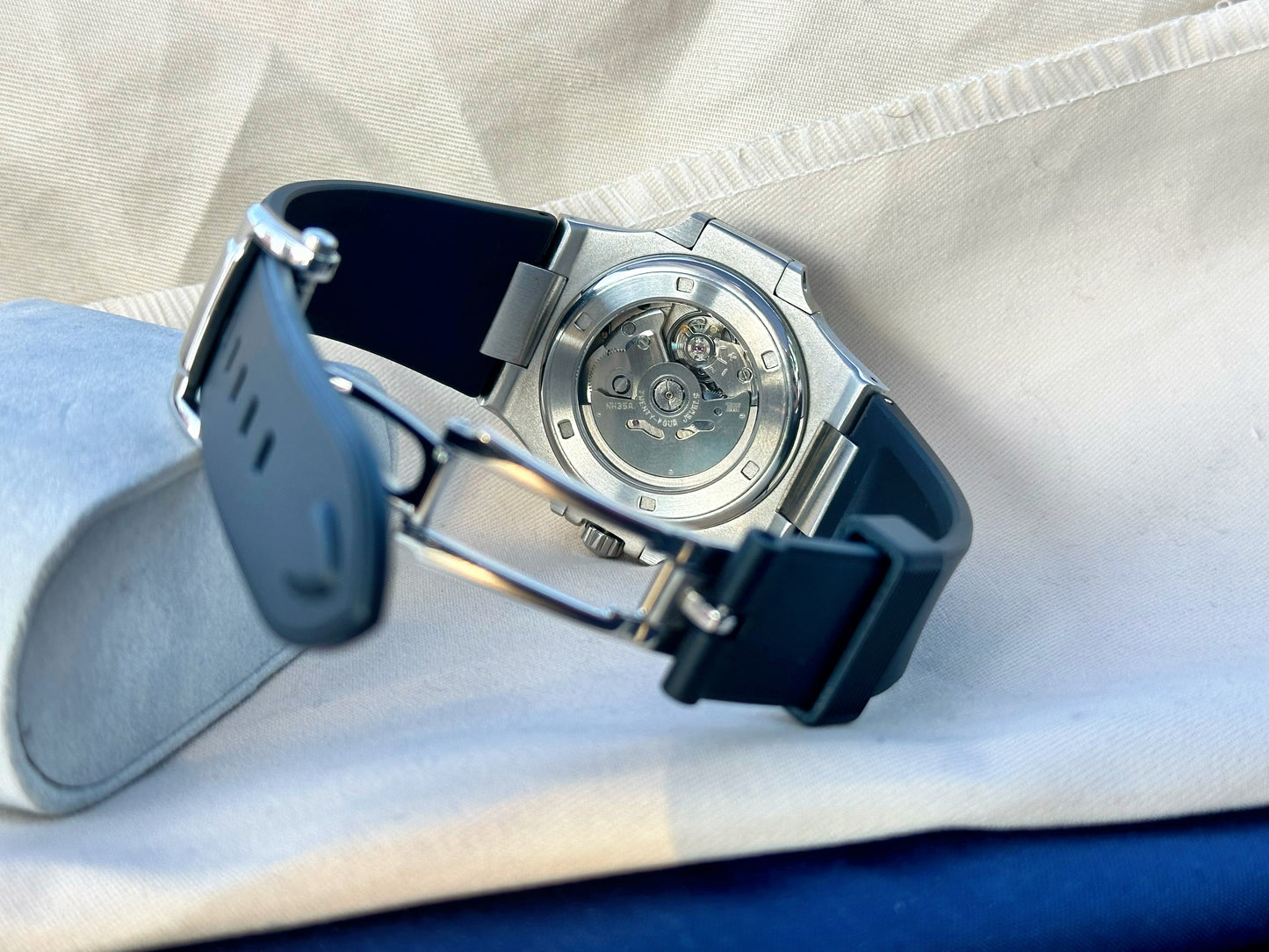 Nautilus style white dial automatic watch
