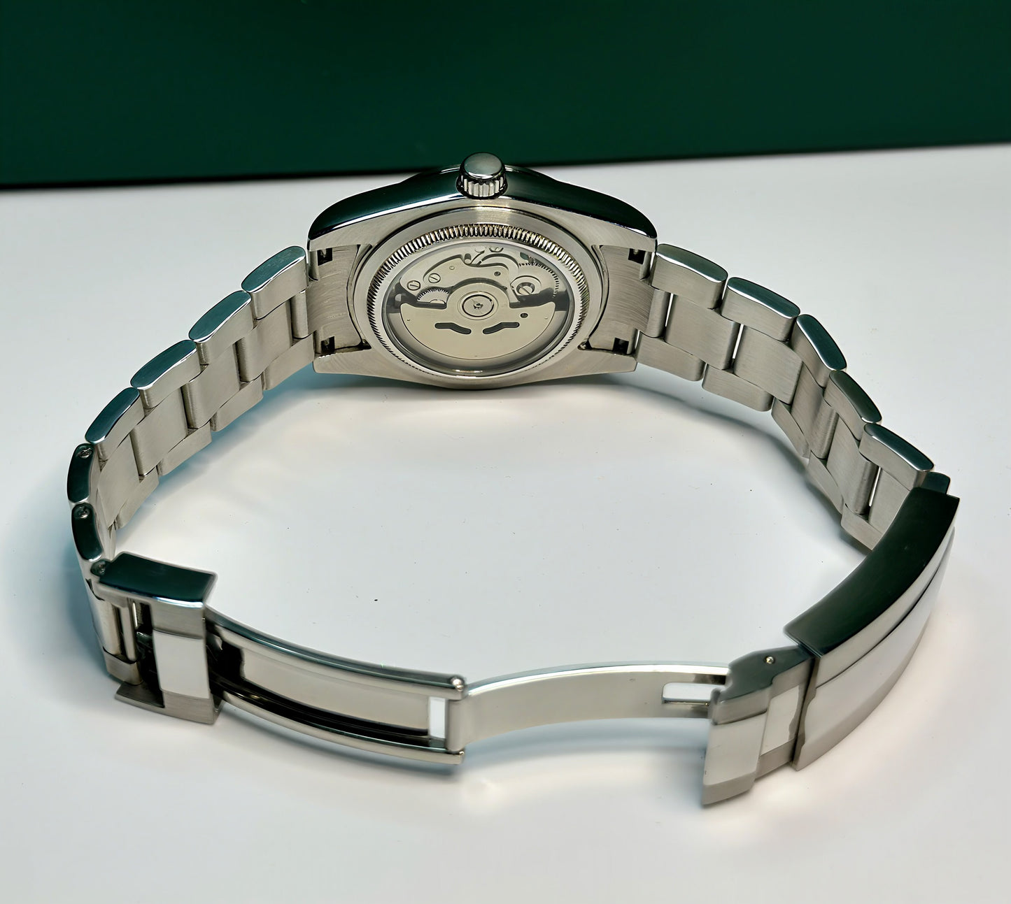 36mm Pink Explorer Automatic Watch on polished center link bracelet