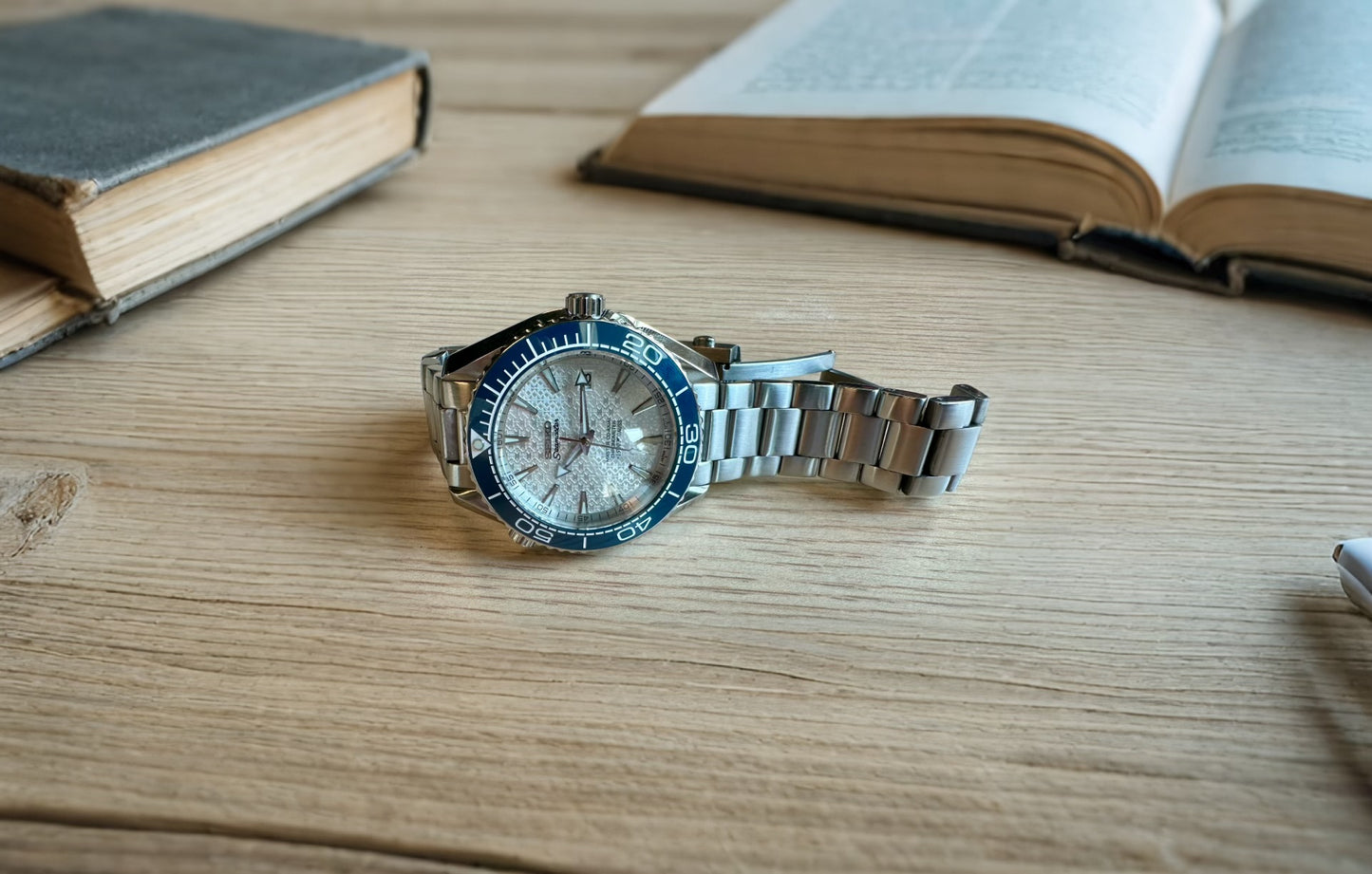 43.5mm Planet Ocean Automatic Homage Watch- Silver textured Dial & Blue Bezel