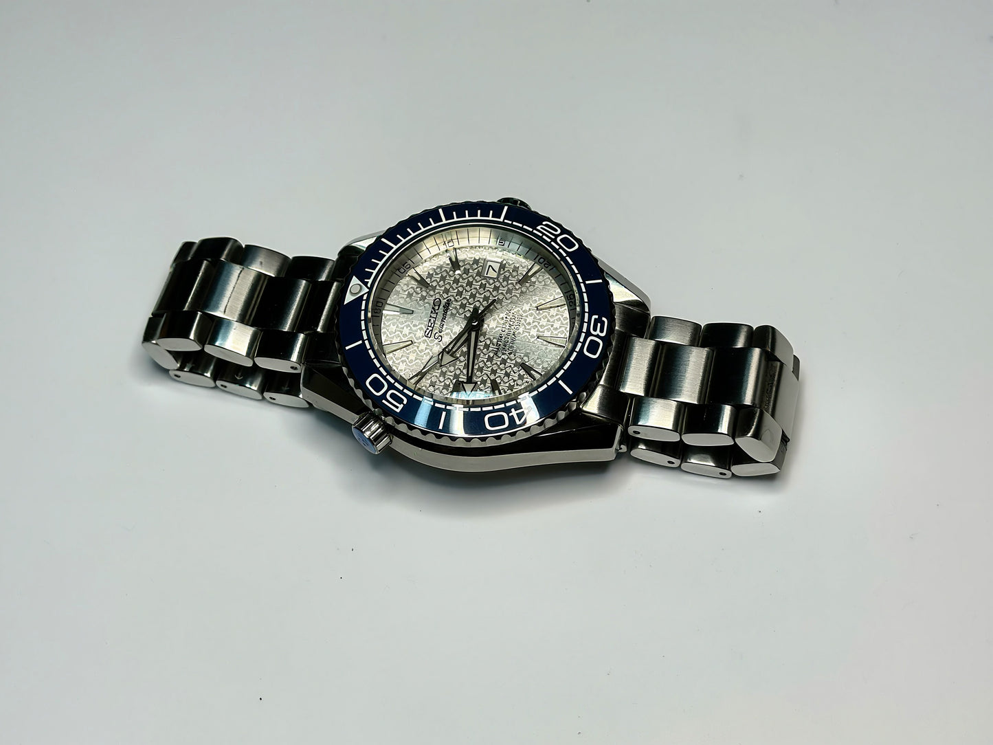 43.5mm Planet Ocean Automatic Homage Watch- Silver textured Dial & Blue Bezel