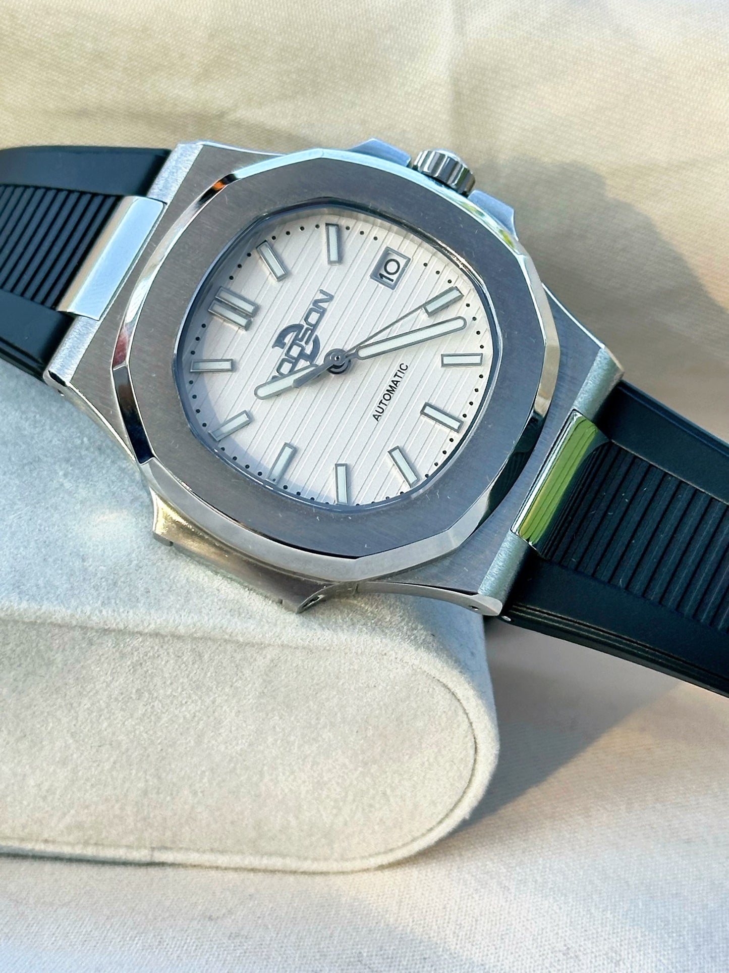 Nautilus style white dial automatic watch