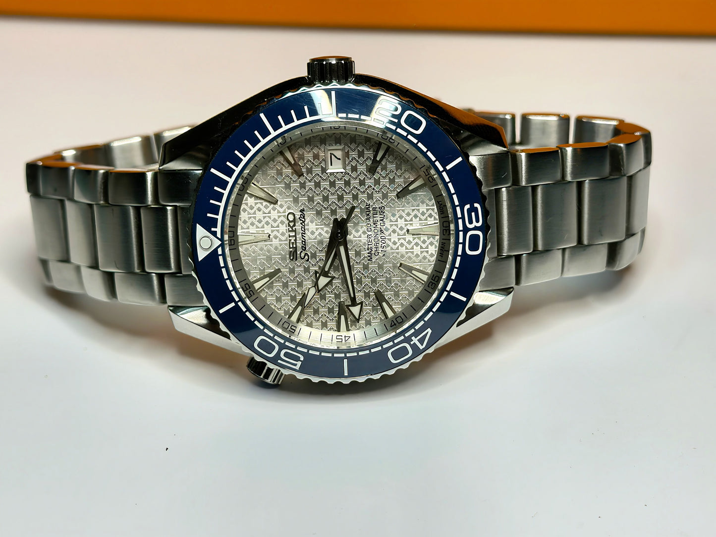 43.5mm Planet Ocean Automatic Homage Watch- Silver textured Dial & Blue Bezel